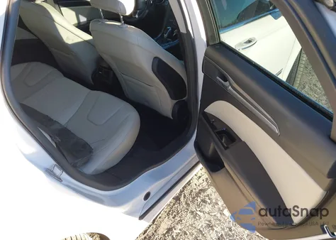 2016 Ford Fusion Energi Titanium from USA, damaged, VIN 3FA6P0SU3GR311816